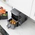 R_SL400UK_InUse_Kitchen_OnCounter_LoadingBasket_Woman (1)
